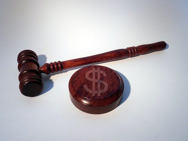 image of judge gavel with a dollar sign